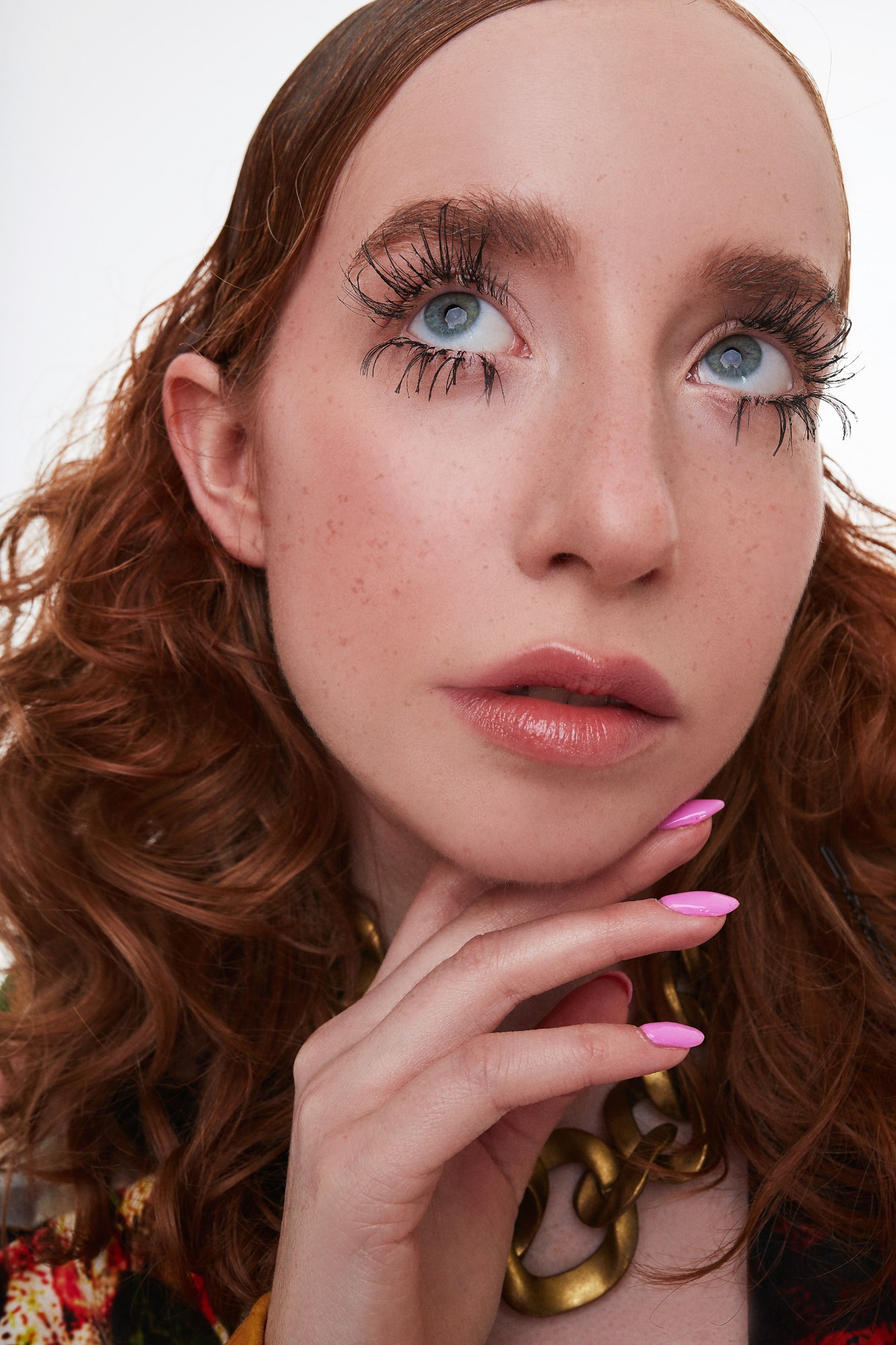 Close-up portrait of Anastasija Aleksejeva with dramatic lashes